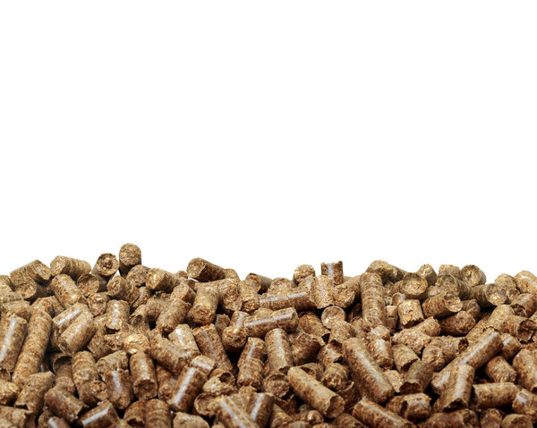 Stack of wooden pellets on white background