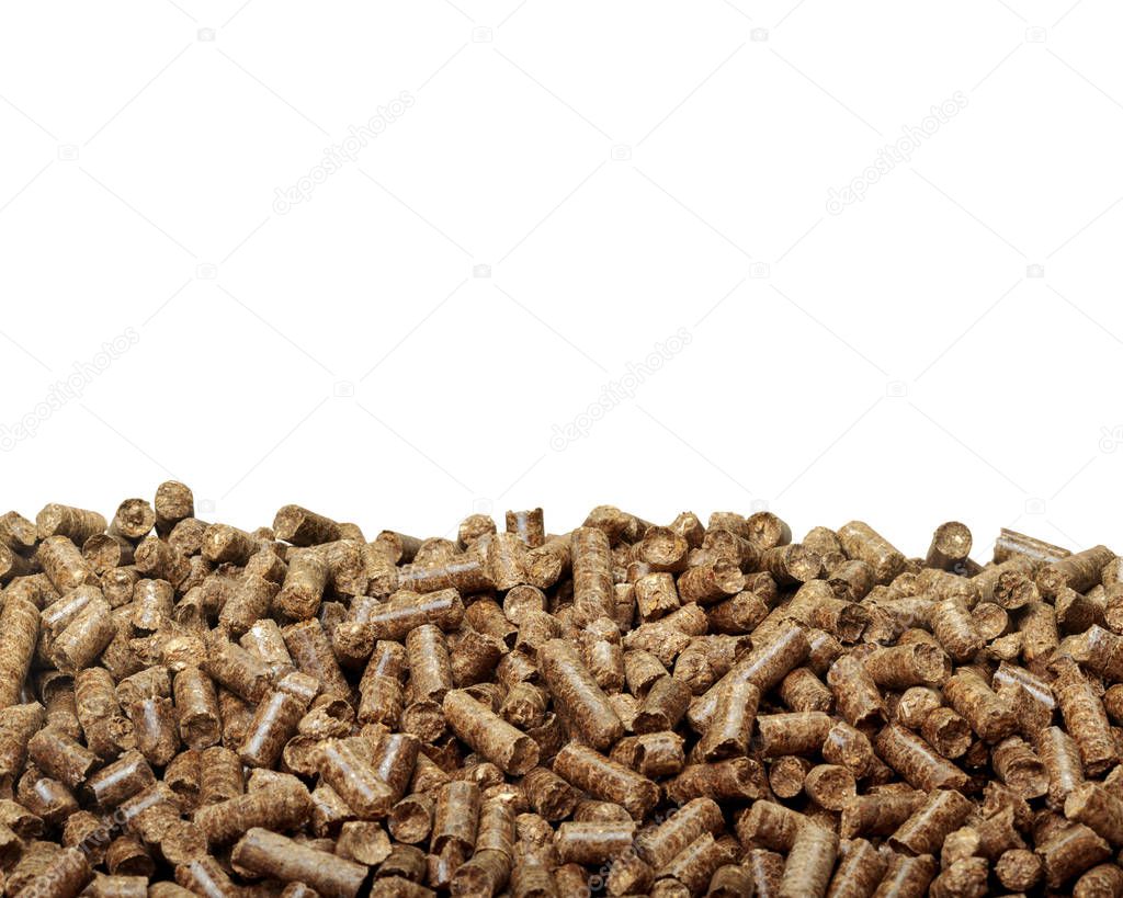 Stack of wooden pellets on white background