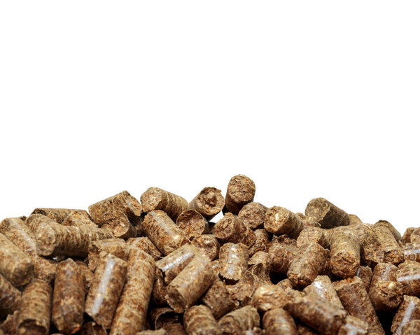 pile of wooden pellets isolated on white background, close-up 