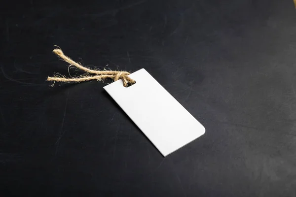 white paper Tag on black background