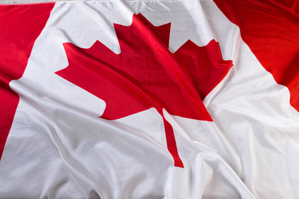 wavy Canadian flag, close up view