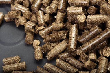 Natural background of wooden pellets. clipart