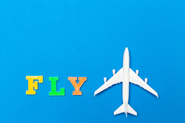 airplane on color background