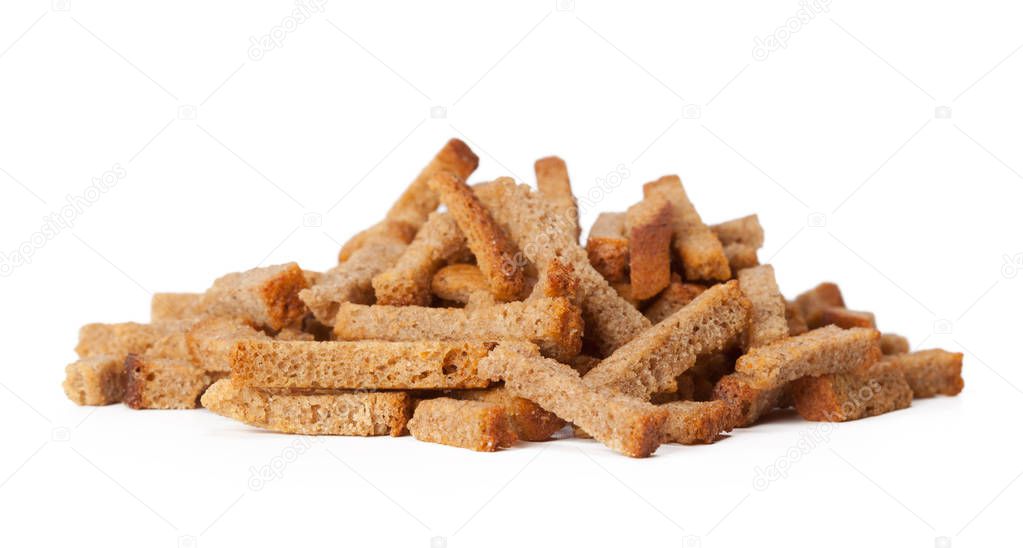 crumbs of bread croutons isolated on white background