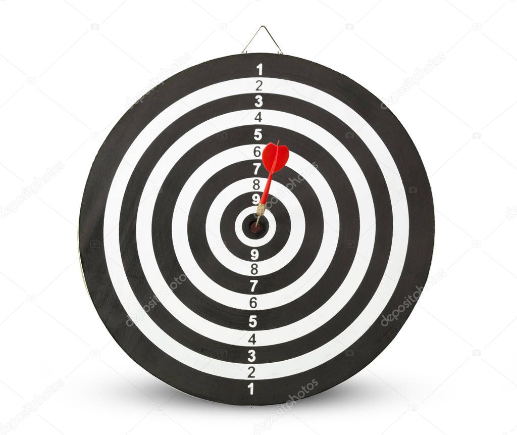 dart arrow in target center of dartboard