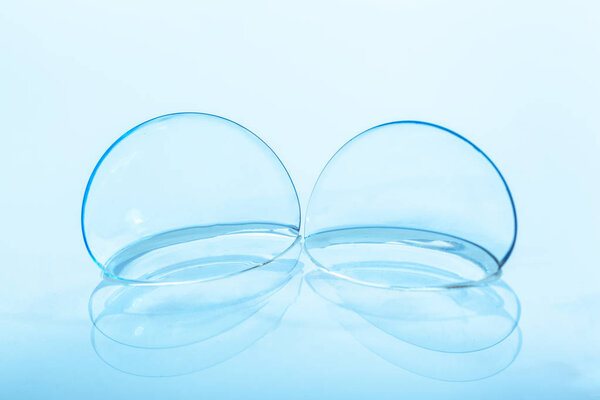 contact lens on blue background