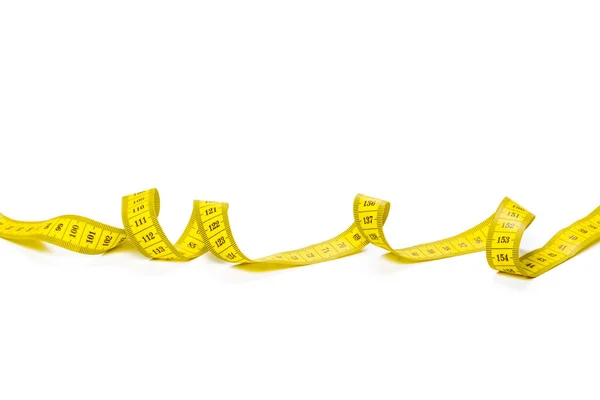 測定テープ白パノラマ背景に分離された黄色のメトリック — ストック写真