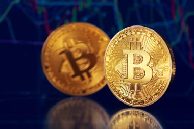 Bitcoin sikkeleri üzerinde ekonomi grafik arka planı