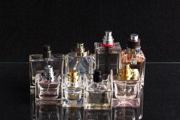 Various Perfume Bottles Dark Background — Stock Photo, Image