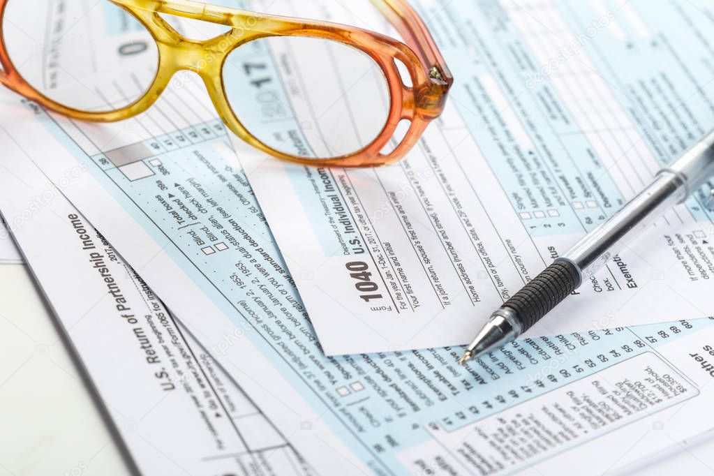 close-up of tax forms, business accessories