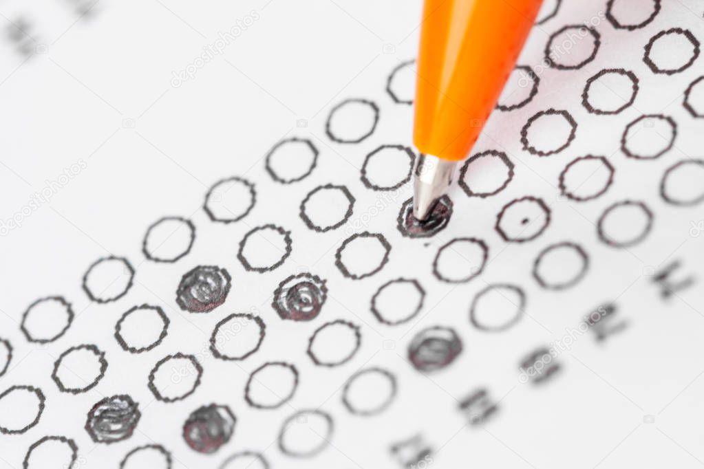 close up view of Test score sheet with answers