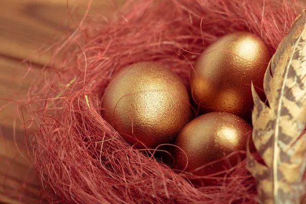 Closeup Gold Eggs Wooden Table — Stock Photo, Image