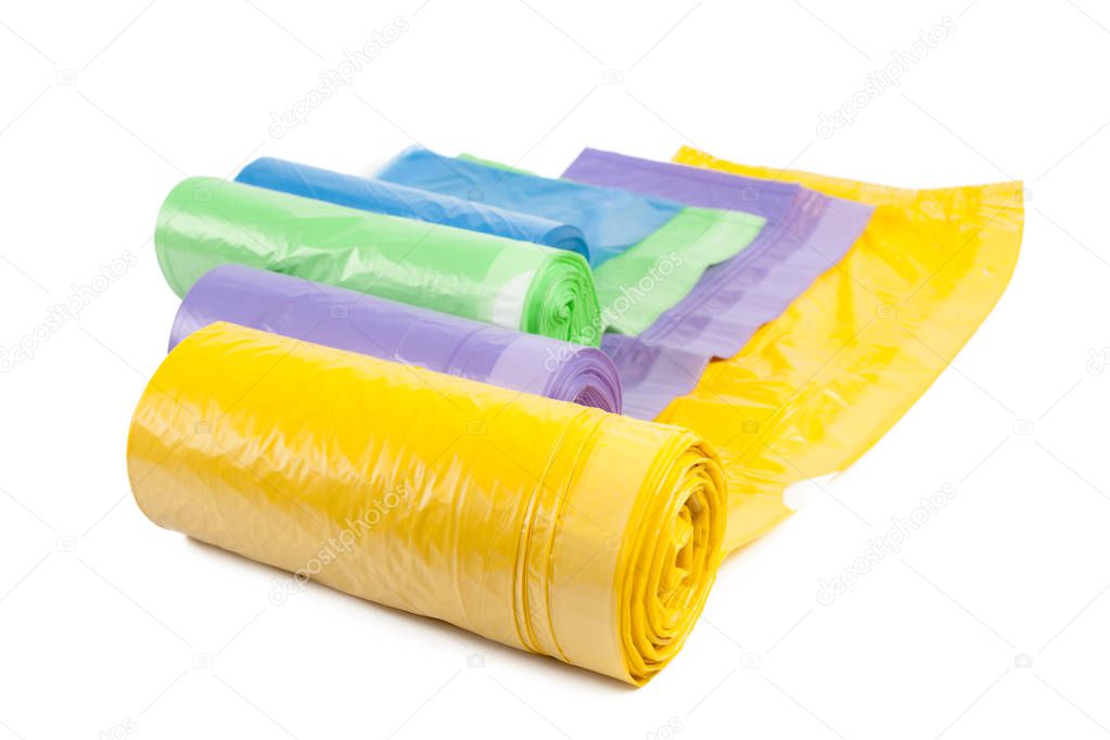 rolls of plastic garbage bags isolated on white background