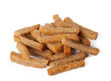 Clos eup beyaz arka plan üzerinde izole kruton ekmek kırıntısı 