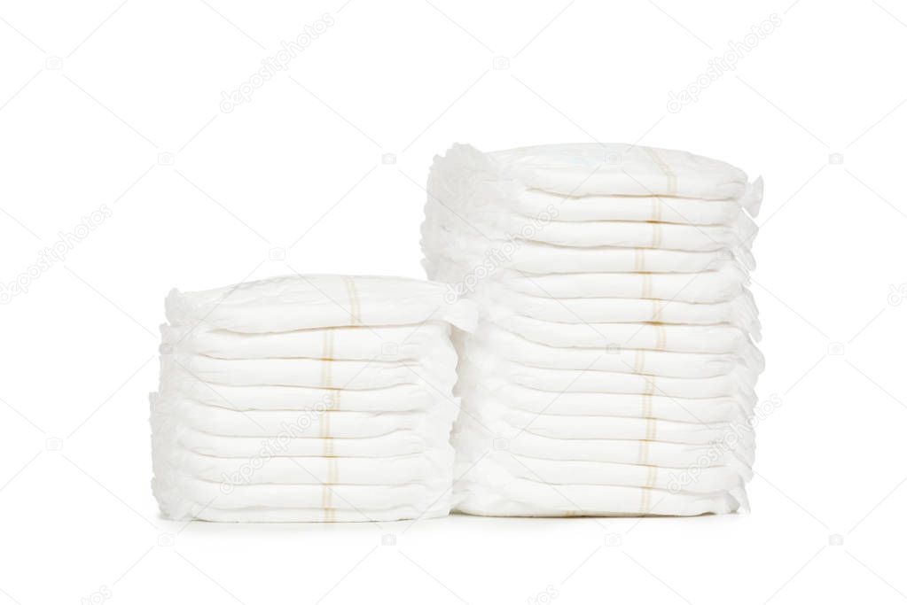close up of Stack of diapers isolated on white background