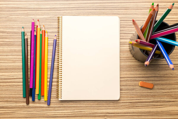 School supplies on wooden background