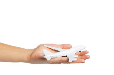 uçak oyuncak model beyaz arka plan üzerinde izole tutan el