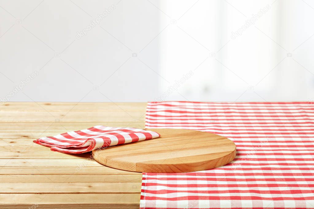 Background with tablecloth on wooden table