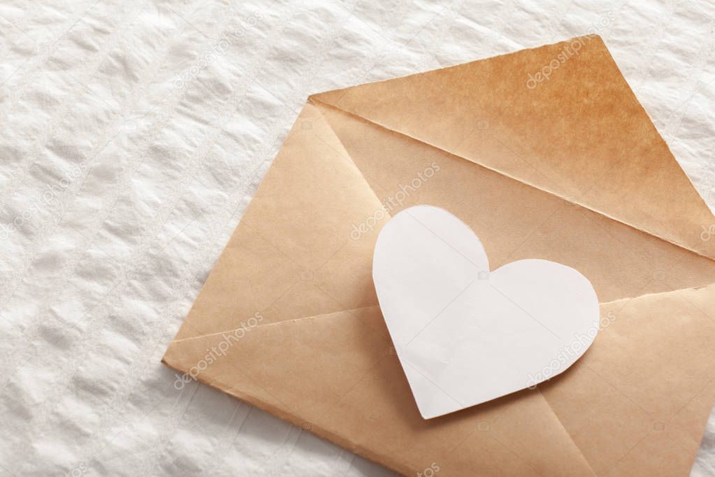 close up of paper heart on  Letter 