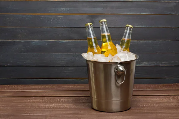 Bucket of Beer on Wooden table
