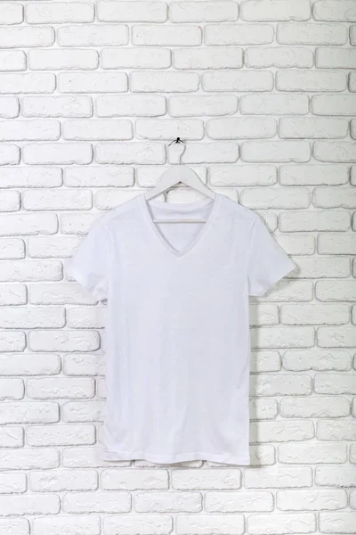 Brick Whitewashed Wall Shirt Hanger — Stock Photo, Image