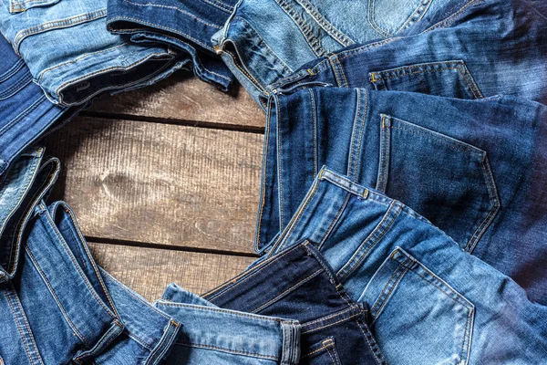 Primer Plano Jeans Sobre Fondo Madera — Foto de Stock