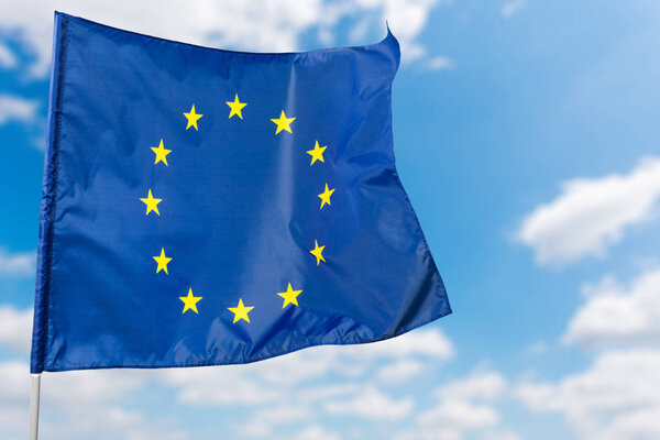 European flag on blue sky background