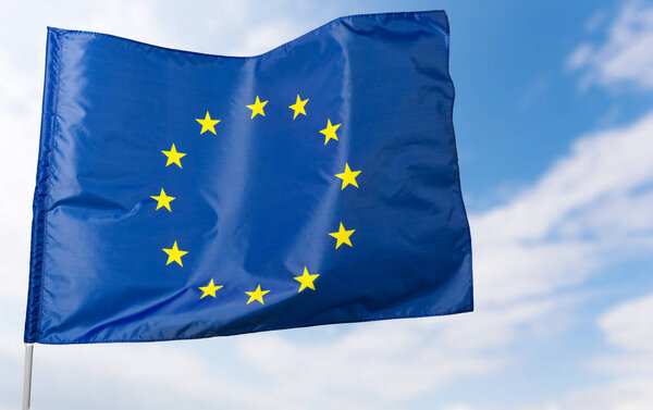 European flag on blue sky background