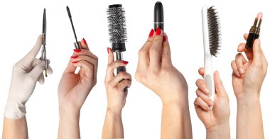 Beyaz arka plan üzerinde izole makyaj için araçları holding eller topluluğu 