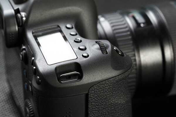 close up of modern digital SLR camera in details 