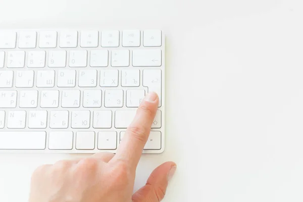 Woman\'s hands using keyboard at the office