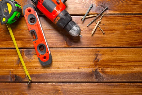 Verschiedene Arbeitswerkzeuge Auf Holz Hintergrund — Stockfoto