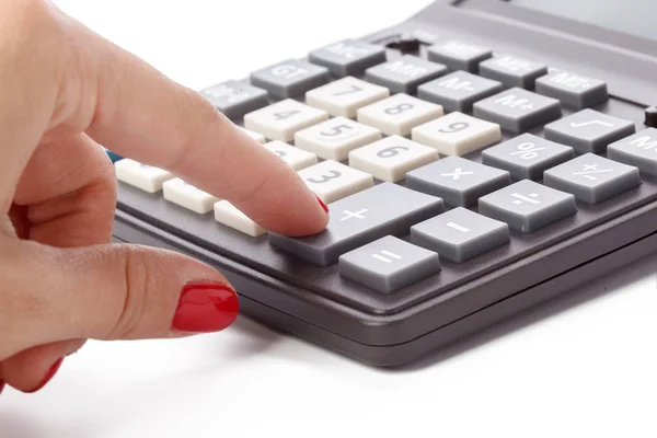 Close Mão Usando Calculadora Preta Isolada Fundo Branco — Fotografia de Stock