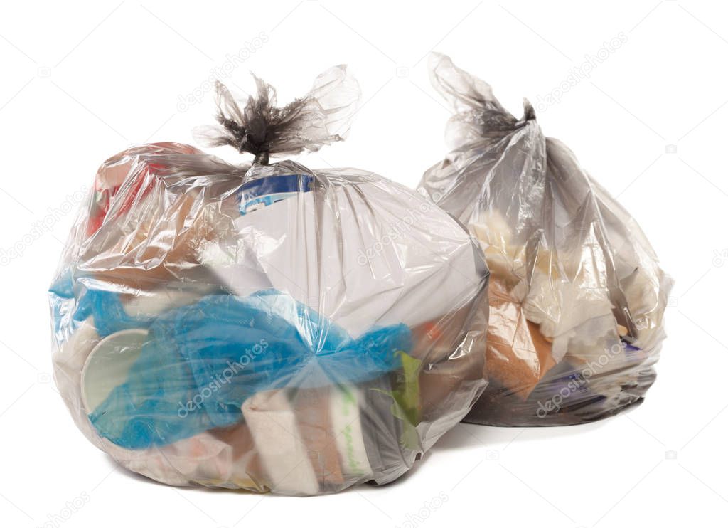 Plastic bags full of rubbish on isolated white background
