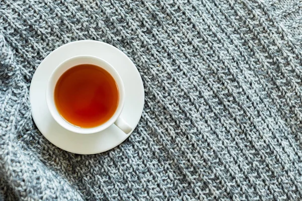 tea in bed on background,close up