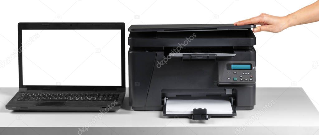 close up of person using moden printer on the table against white background 