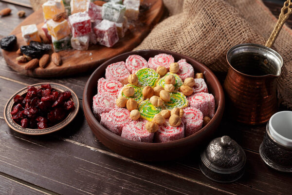 close up of Turkish delight on a wooden table.