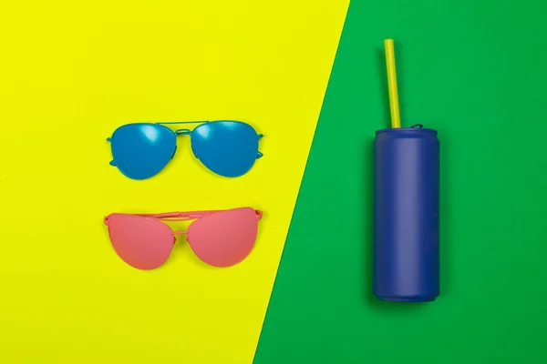 Fashionable sunglasses on minimal colorful background