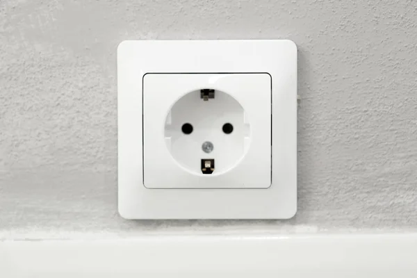 Power socket in concrete wall