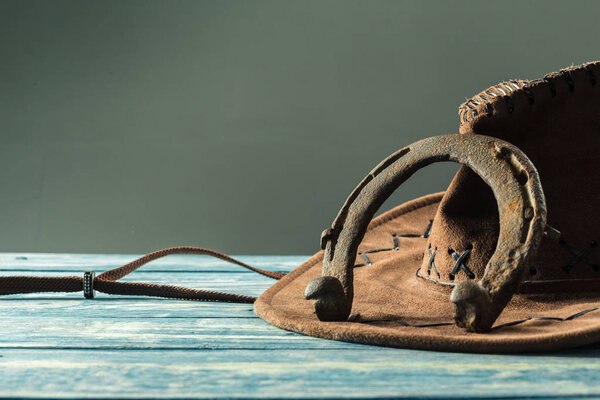 old rusty horseshoe on vintage background
