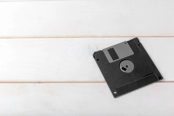 close up of Computer floppy disk on wooden background