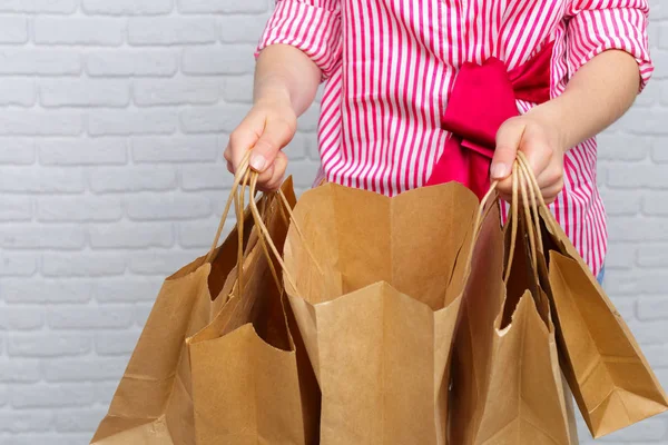 Hands Holding Paper Bags — Stock Photo, Image