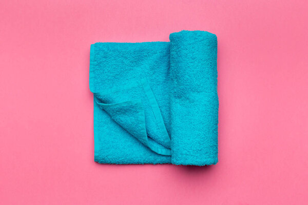 top view of spa towels on colorful background