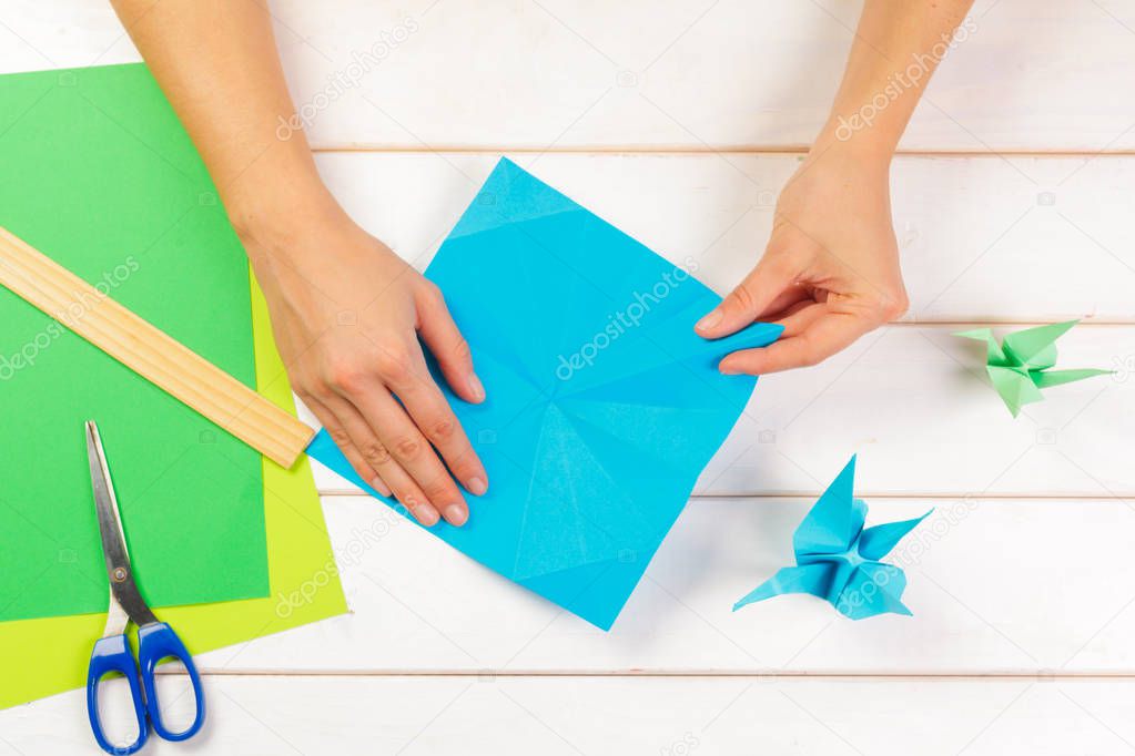 close-up of origami papers on colorful background