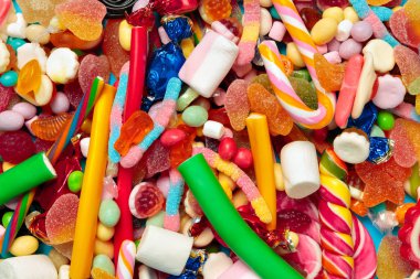 Farklı renkli meyve şekerleri arka planı kapat 