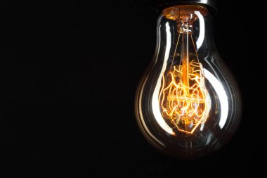 Klasik Edison ampul metin için yer ile koyu arka plan üzerinde