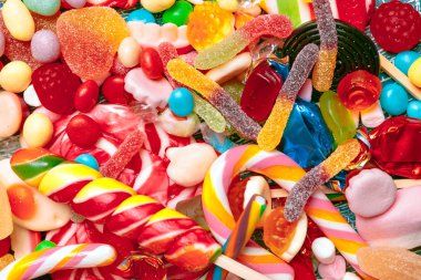 Farklı renkli meyve şekerleri arka planı kapat 