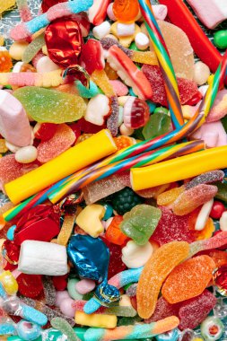 Farklı renkli meyve şekerleri arka planı kapat 