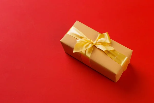close up of gift box on colorful background