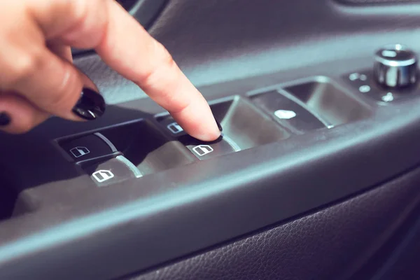 Control panel on the armrest of the car door